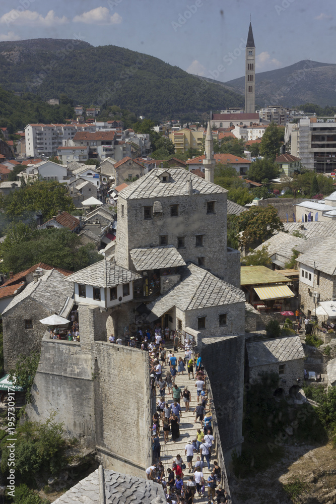 View from the top of the historic Mostar bridge full of people