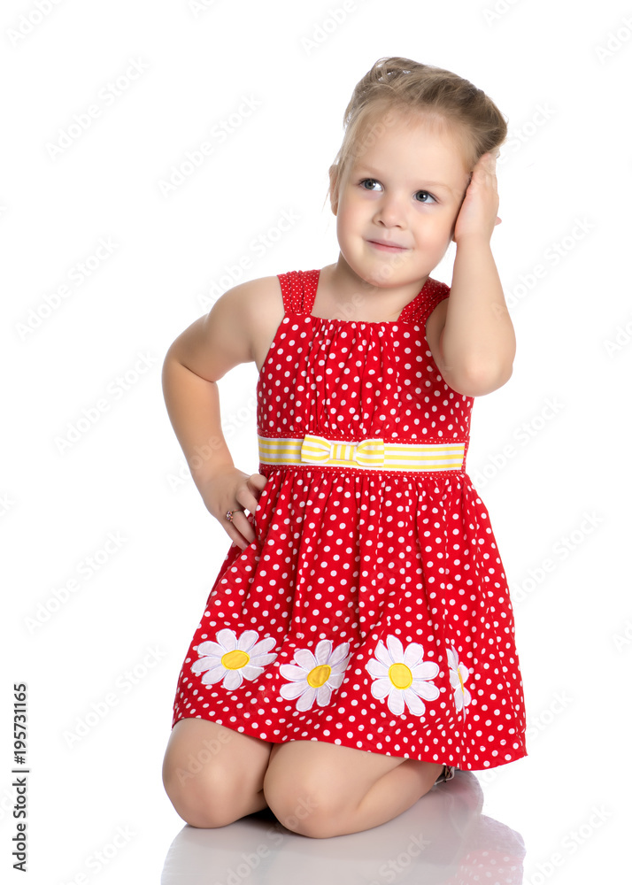 Little girl is sitting on the floor. Little girl is sitting on the floor.