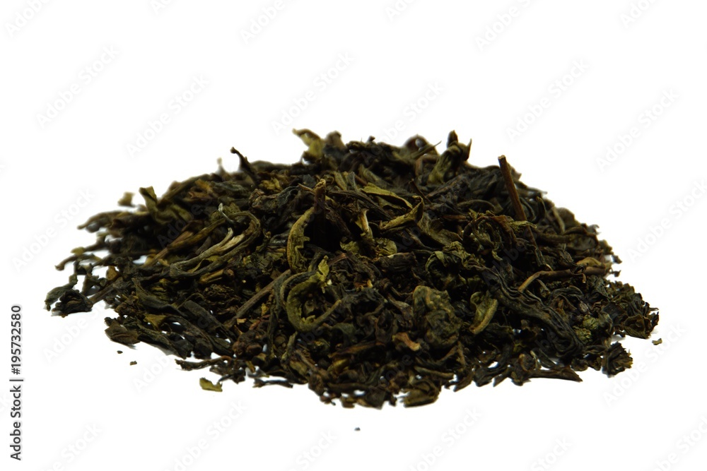 Tea leaves on white background. Focus on the front, obviously the background blurred. Tea leaves on white background. Focus on the front, obviously the background blurred.