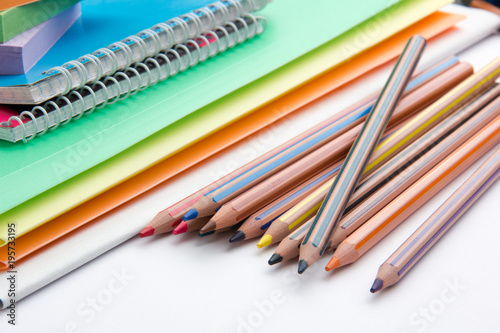 pencils folders and notebooks on the office table