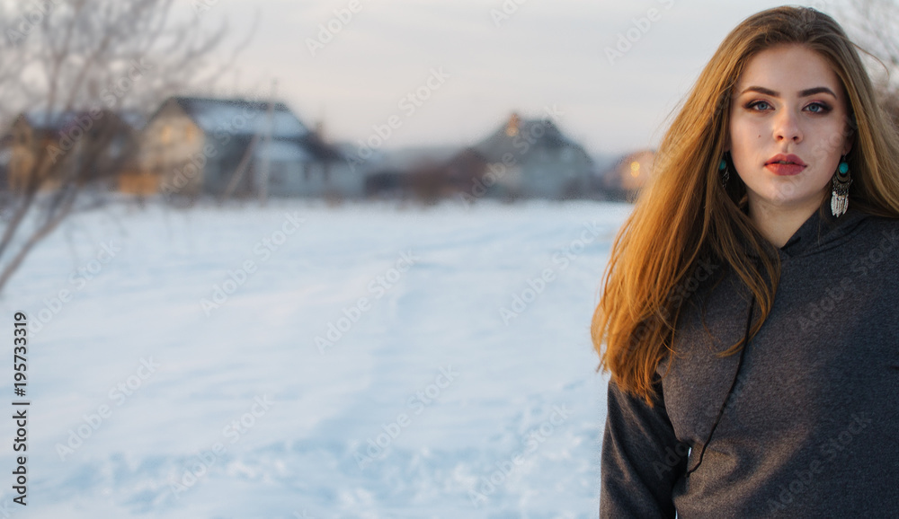 Young smiling girl in the winter Young smiling girl in the winter