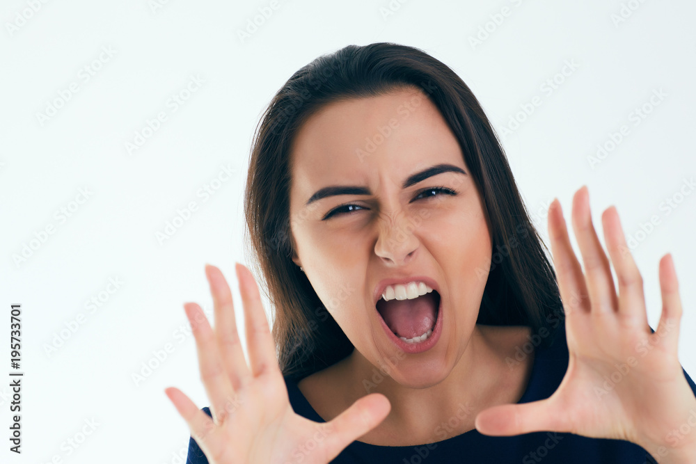 Young businesswoman shouting isolated on white background. Advertising, annonce, message, event.