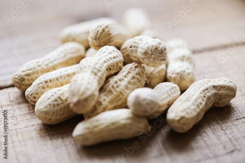 Peanuts on wooden table