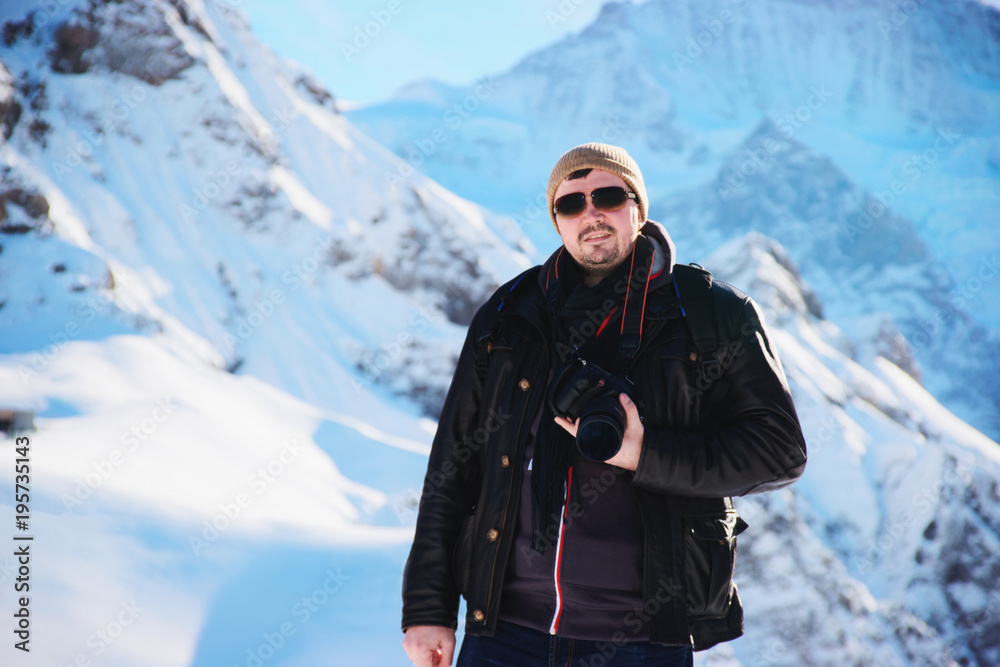 Man with camera in Mannlichen mountain
