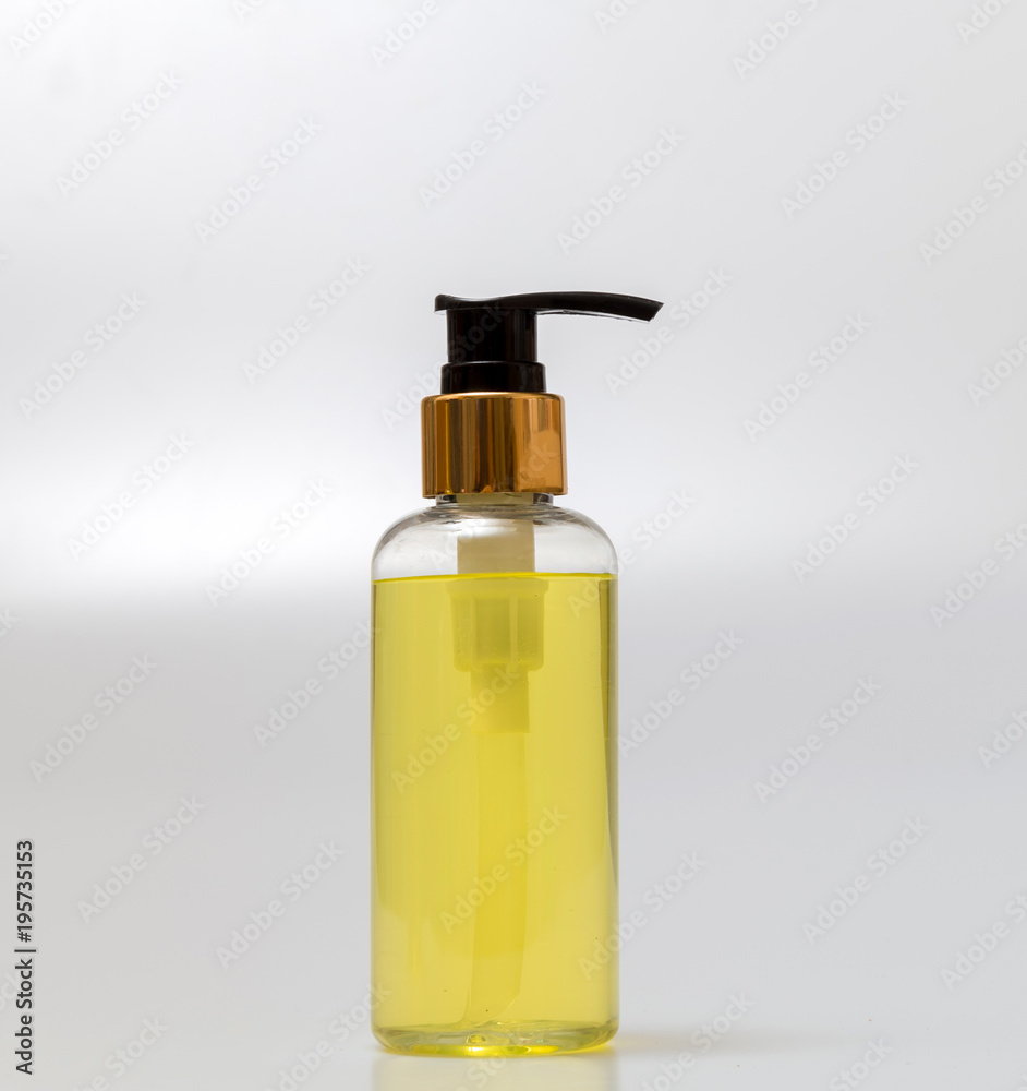 Essential oils placed on a white table. Spa concept.