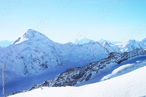 Mountain peaks ridge and Aletsch glacier at winter Swiss Alps © Roman Babakin
