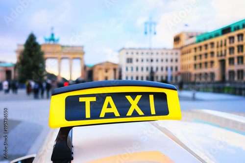 Taxi sign board in street of Berlin Brandenburg gate