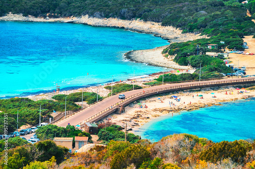 Scenery with road and beach at Santa Teresa Gallura photo