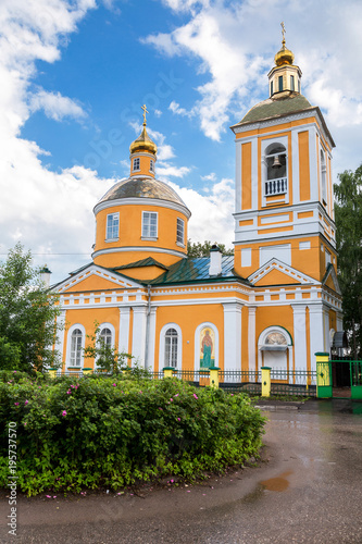 Trinity Church after the rain in summertime in Bologoe, Russia photo