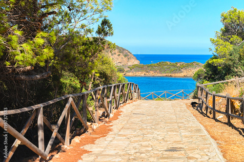 Fototapeta Naklejka Na Ścianę i Meble -  Pathway at Chia beach at Mediterranian Sea Sardinia