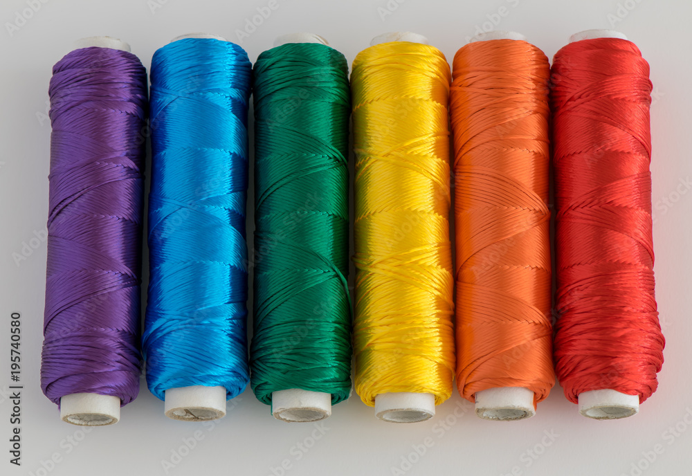 Rainbow flag. LGTB symbol made with colorful spools of thread. Rainbow flag. LGTB symbol made with colorful spools of thread.