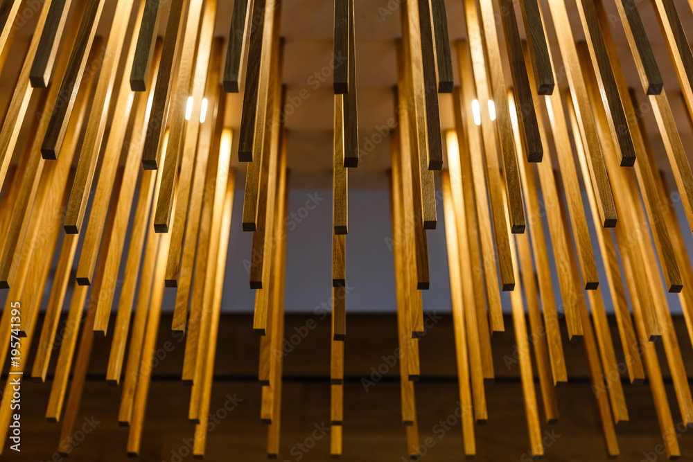 texture of wooden sticks hang from the ceiling at outdoor constructions texture of wooden sticks hang from the ceiling at outdoor constructions