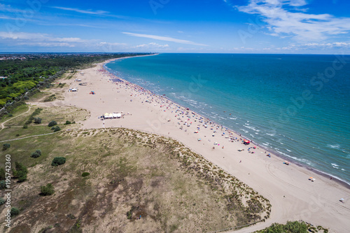 Italy, the beach of the Adriatic sea. Rest on the sea near Venice. Aerial FPV drone photography. © Andrei Armiagov