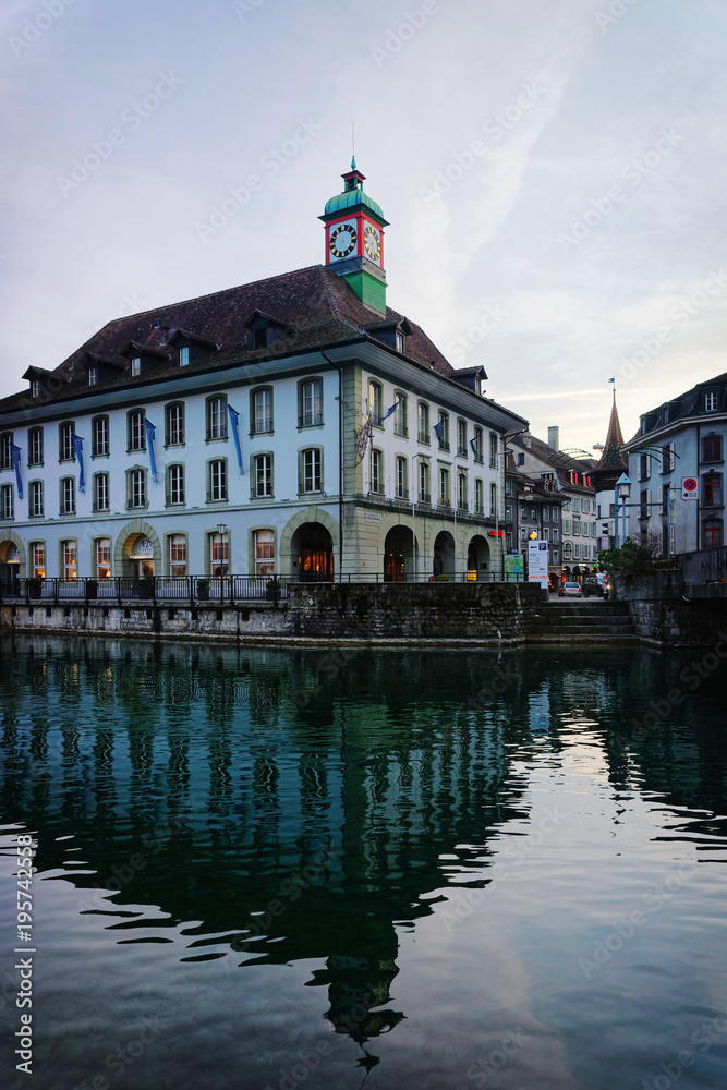 Building with Clock tower in Embankment Thun Old City Switzerland