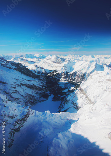 Mountain peaks ridge with Aletsch glacier at winter Swiss Alps