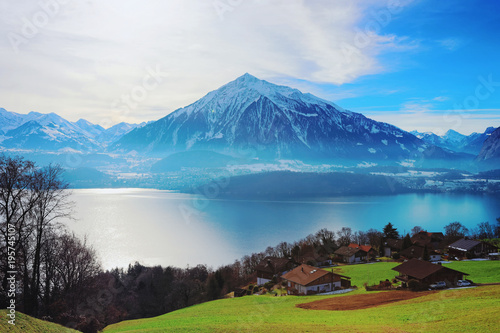 Sigrilwil village at Swiss Alps mountains and Thunersee lake photo