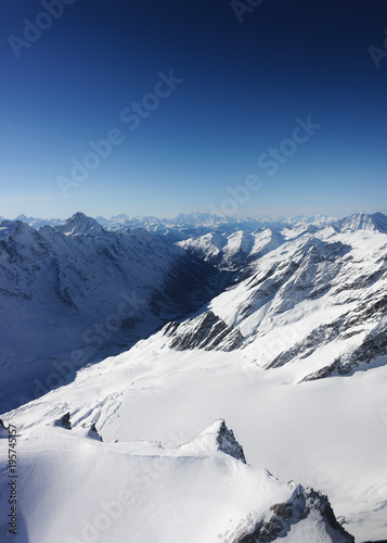 Mountain peaks and Aletsch glacier winter Swiss Alps Switzerland © Roman Babakin