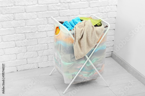 Laundry basket with dirty c...