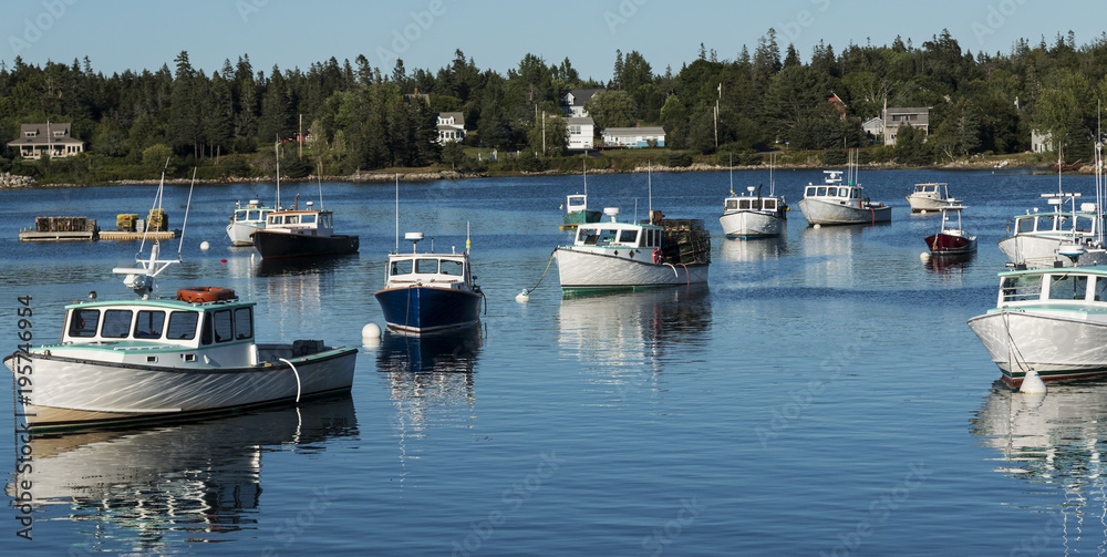 Fishing boats moored in Bass Harbor Maine at dusk