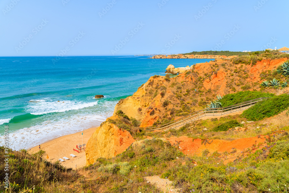 Sandy beach Praia da Rocha in Portimao town on coast of Portugal