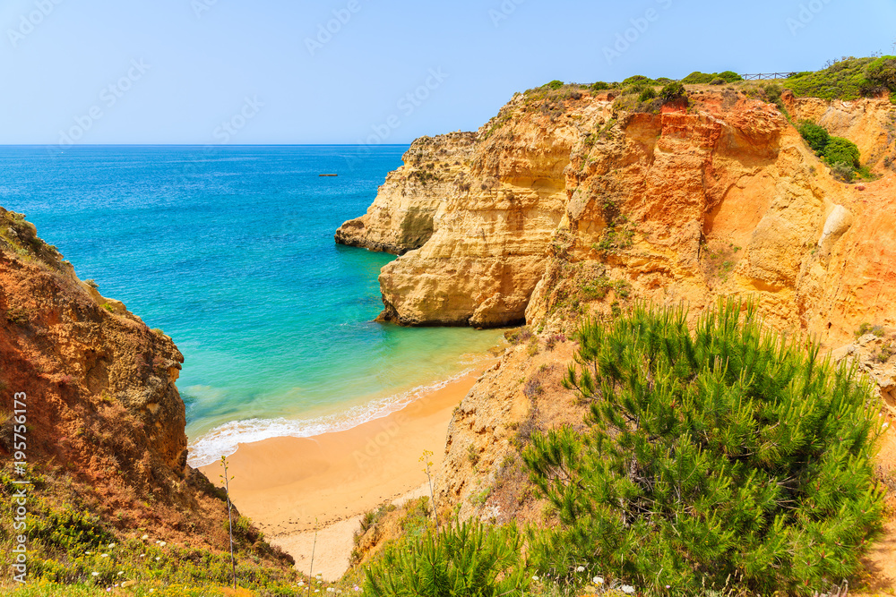 Fototapeta premium View of beautiful beach with rocks near Portimao town, Algarve, Portugal