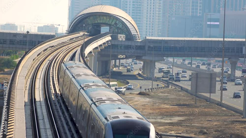 Metro train arrival to station in Dubai.