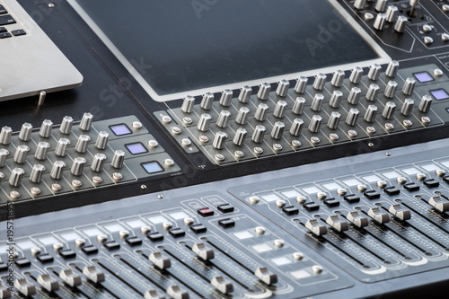 Professional dj audio mixer console. Close-up shot photo