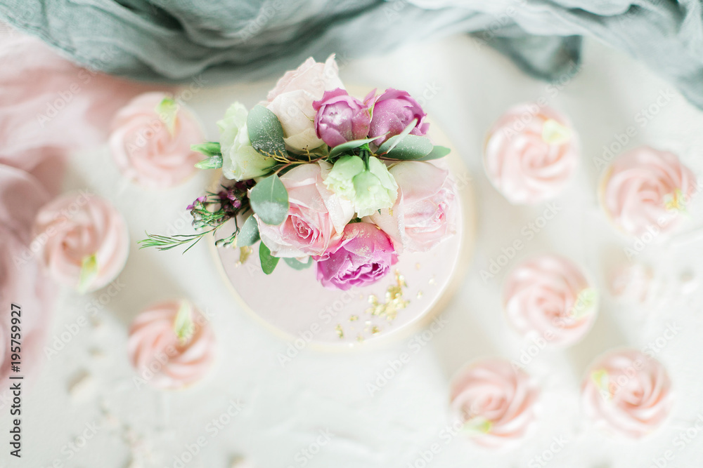 Wedding cake decorated with roses and flowers. Top view, flat way Wedding cake decorated with roses and flowers. Top view, flat way
