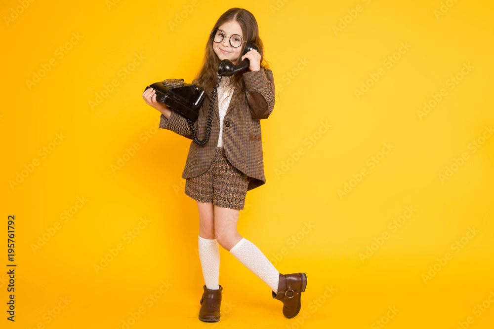 Little girl with telephone