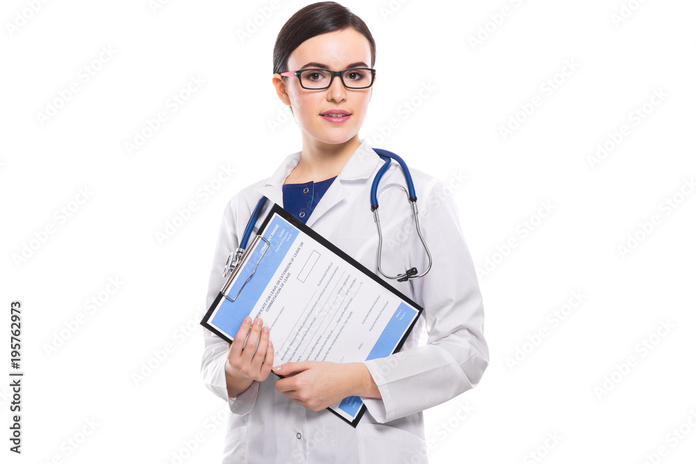 Young woman doctor with stethoscope holding clipboard in her hands in white uniform on white background
