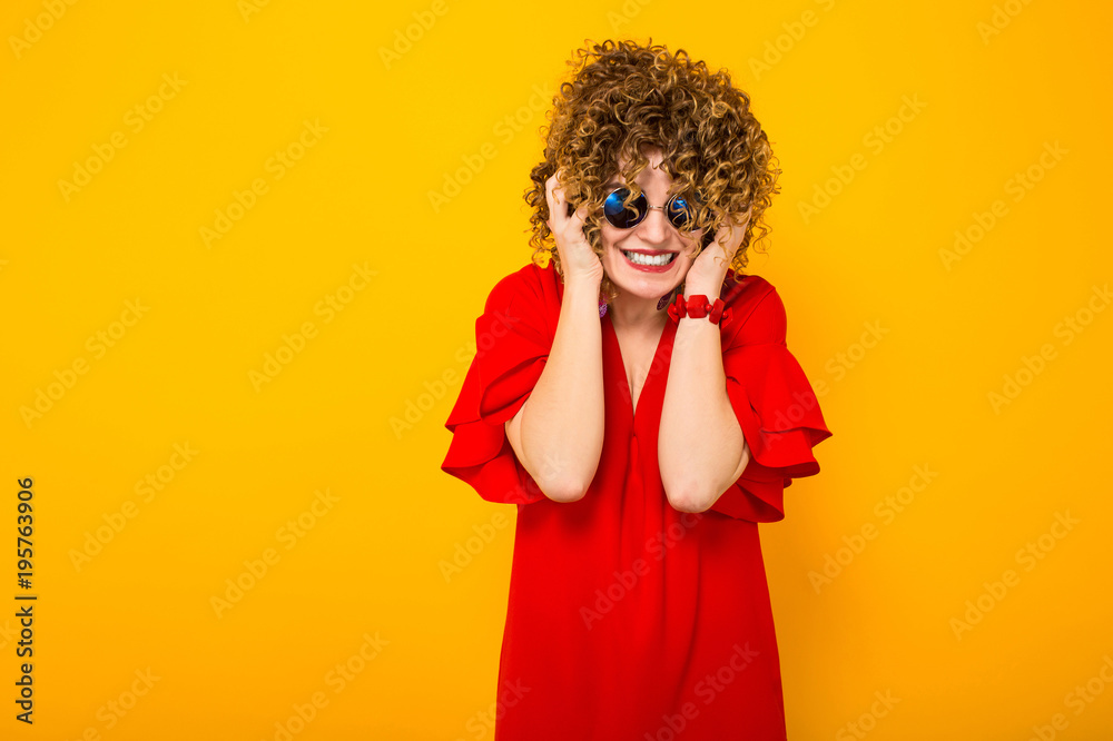 Attractive woman with short curly hair