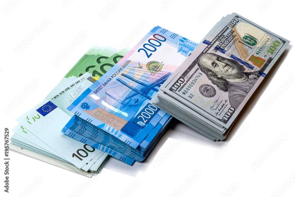 Packs of money in three currencies Packs of money in three currencies