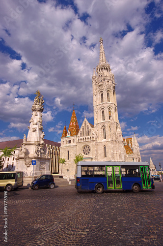 Matthias Church in Budapest city, Hungary. wide view and bus in the frame