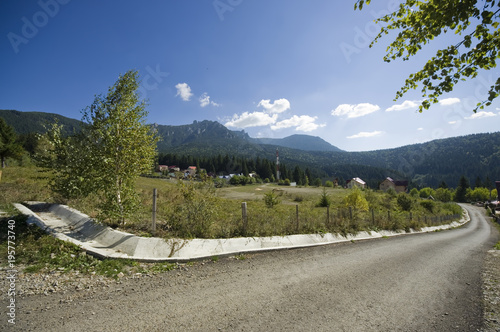 road and mountain landscape, Durau. Romanian Carpathians