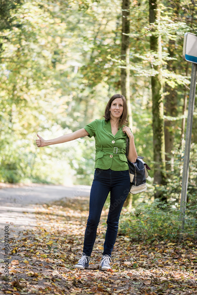 Front view of a woman hitchhiker