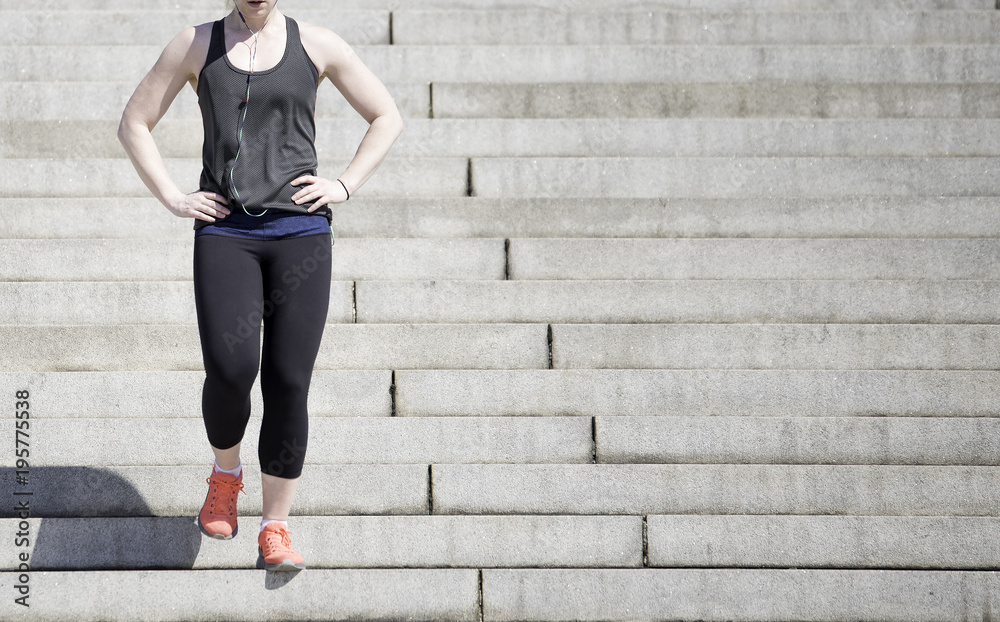 Young woman doing fitness workout on stairs. Young woman doing fitness workout on stairs.