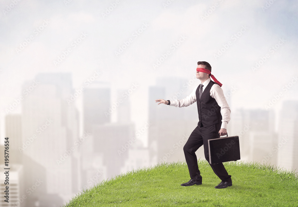 Blindfolded businessman concept Blindfolded businessman concept