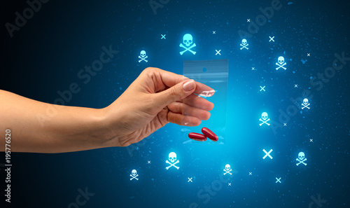 Handing over pills with skulls photo