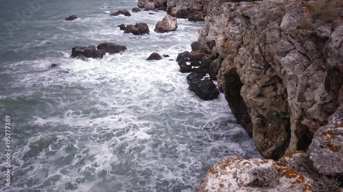 Storm on the sea in the Black Sea, stone coast, Bulgaria, near the village of Tyulenovo photo