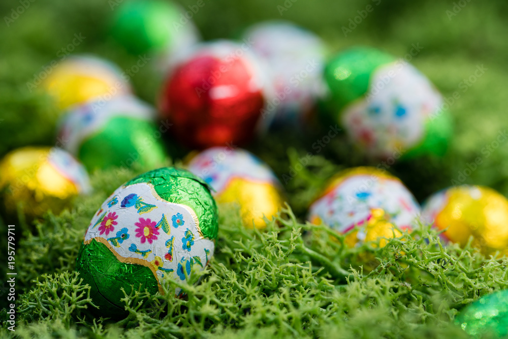 chocolate easter eggs on green lawn chocolate easter eggs on green lawn