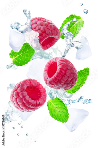 Flying Raspberry with mint leaves and a spray of water