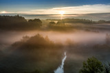 Sunrise at foggy valley in autumn, Poland