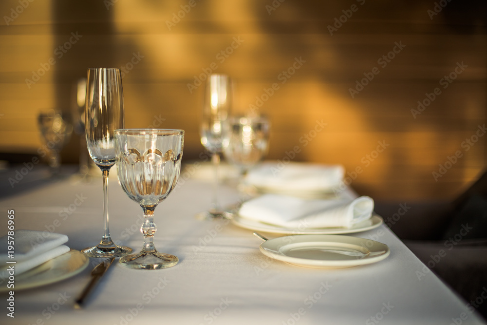 Empty glasses on a background of green grass. Empty glasses on a background of green grass.