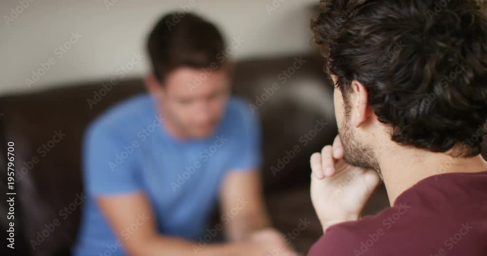 4K Male therapist in counselling session with depressed male patient. Slow motion. 4K Male therapist in counselling session with depressed male patient. Slow motion.