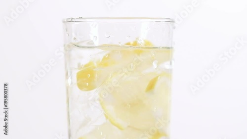 Wallpaper Mural water in a glass with lemon and ice isolated on white background Torontodigital.ca