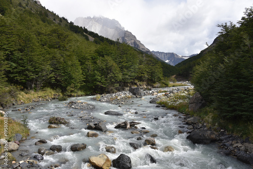 River flows along the Valle Asencio near Refugio Chileno in Torres del Paine National Park, Patagonia, Chile photo