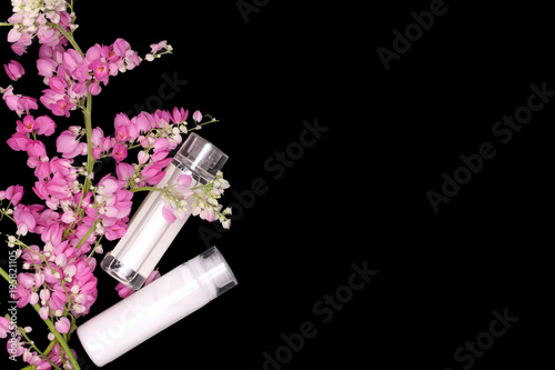 pink flower climbers with shampoo and conditioner bottles