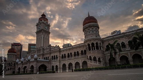KUALA LUMPUR - MARCH 10: A beautiful zooming out of moving cloud and sunrise view of The Sultan Abdul Samad Building on March 10, 2018 in Kuala Lumpur.