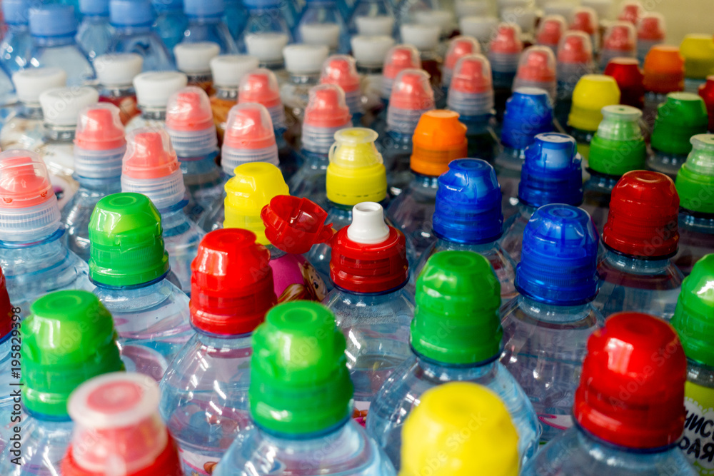 plastic bottles with water, color caps plastic bottles with water, color caps