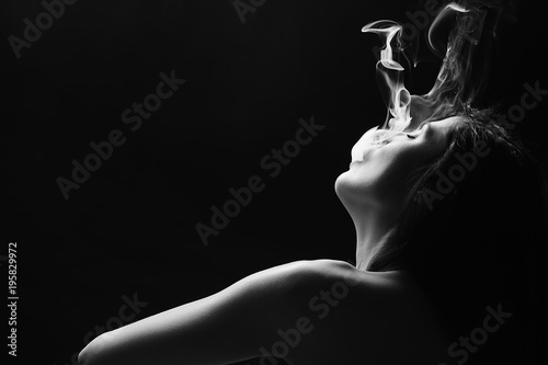 Sexy body nude woman. Naked sensual beautiful girl. Artistic black and white photo.